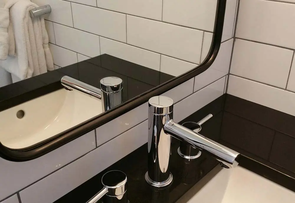 close up faucet on vanity