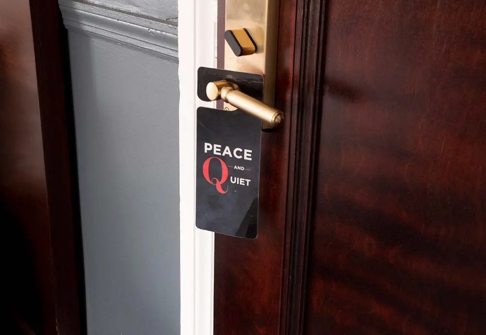 Peace and quiet sign on hotel door knob