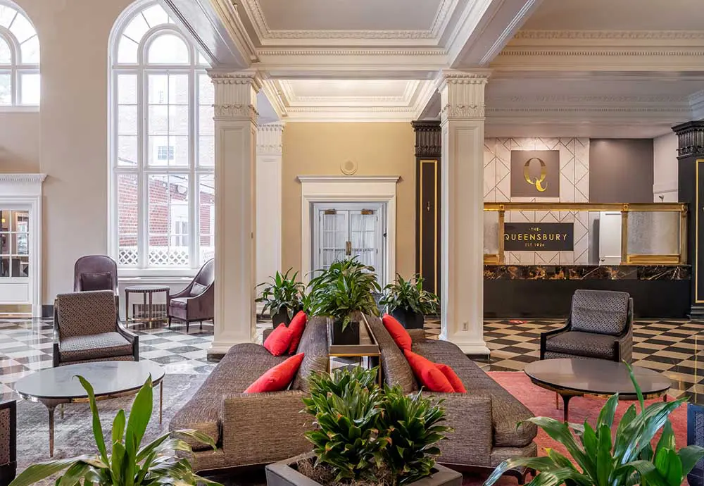 hotel lobby with seating and front desk