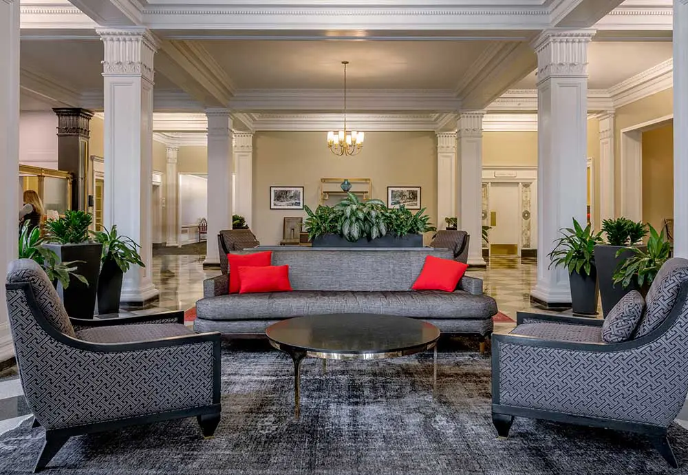 hotel lobby with chairs and sofa