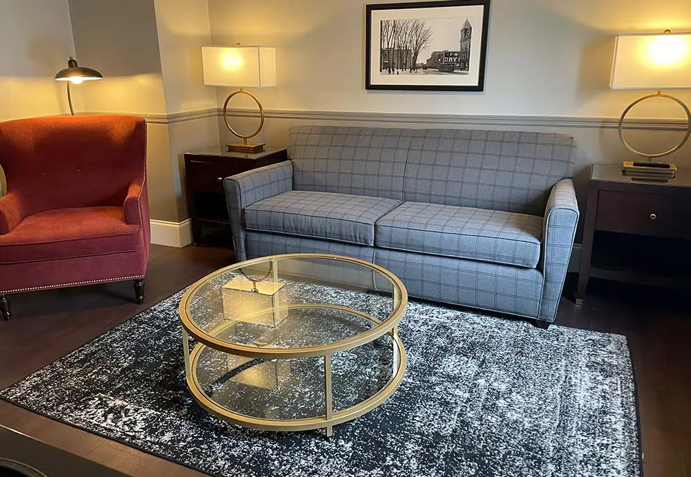 Couch and chair in hotel suite
